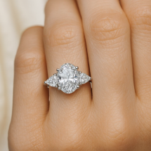 Platinum Oval And Trilliant Cut 3.20ct Lab Diamond 3 Stone