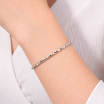 Sterling Silver Polished Twist Design Hinged Bangle