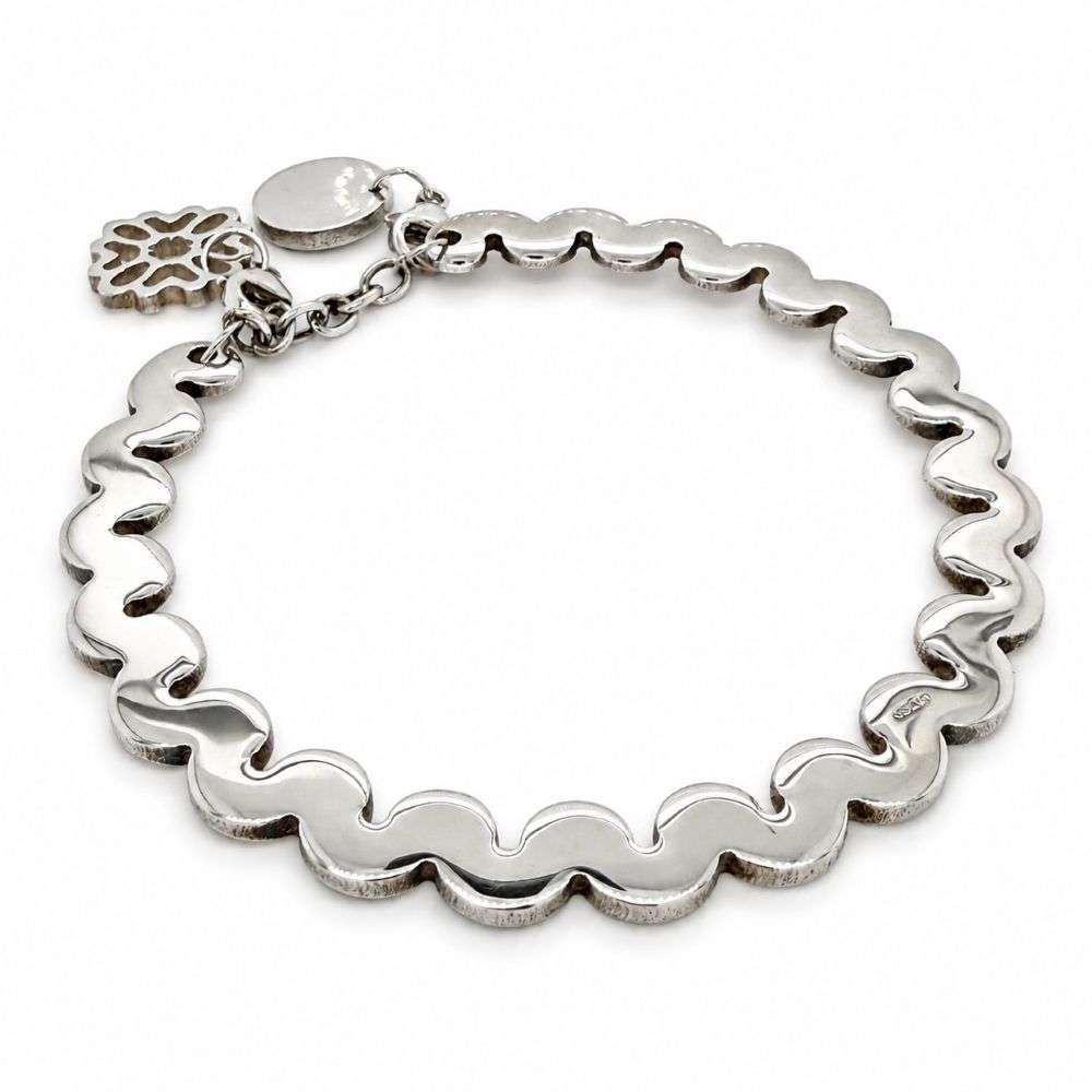 LB140 Newbridge Standing Wave bangle and charm front image LB140 Newbridge Standing Wave bangle and charm front image